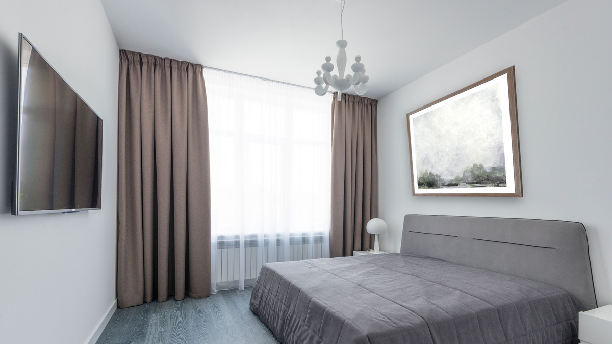 Forest Edge by Dan Hobday, shown at 32 × 32 in (81.3 × 81.3 cm) in Arber Light Walnut, bedroom