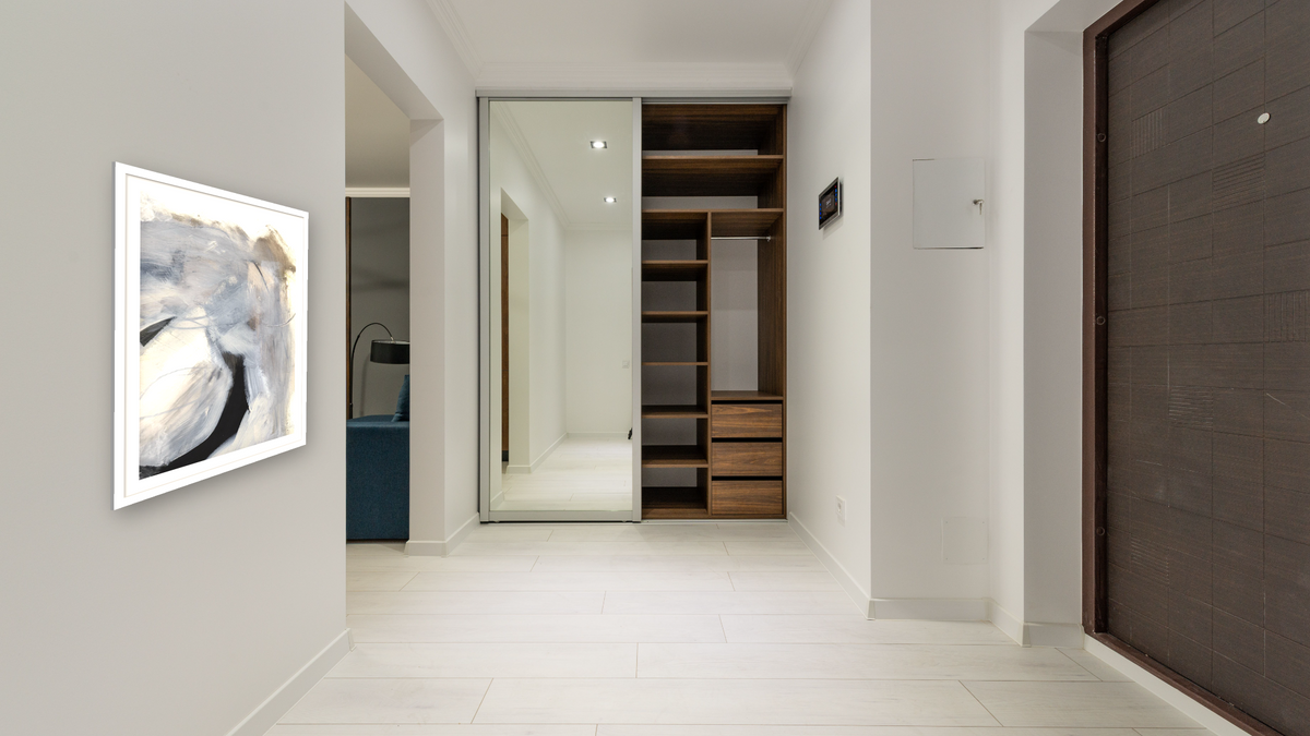 Cotswold by Dan Hobday, shown at 30 × 42 in (76.2 × 106.7 cm) in Arber Light Walnut, hallway