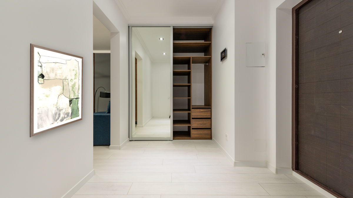 Green Set 3 by Dan Hobday, shown at 30 × 42 in (76.2 × 106.7 cm) in Arber Light Walnut, hallway