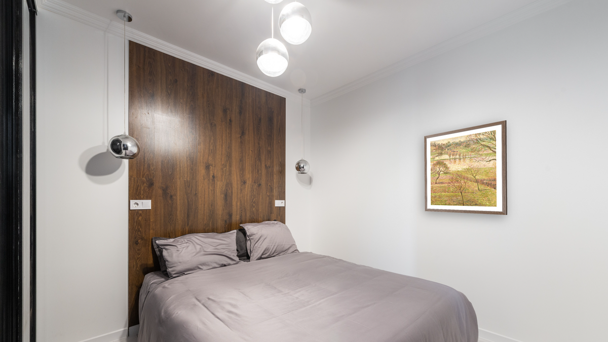 The Flood at Eragny by Camille Pissarro, shown at 32 × 32 in (81.3 × 81.3 cm) in Arber Light Walnut, bedroom