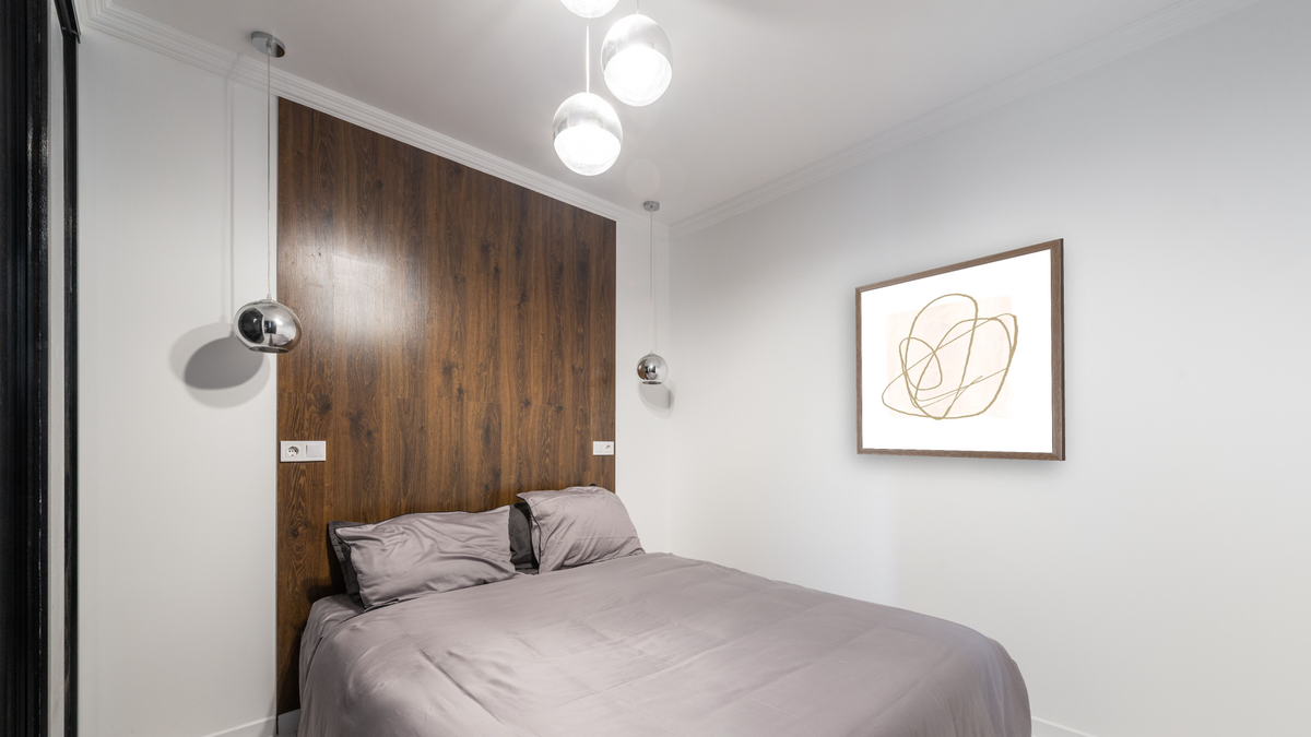 Touch 2 by Dan Hobday, shown at 32 × 32 in (81.3 × 81.3 cm) in Arber Light Walnut, bedroom