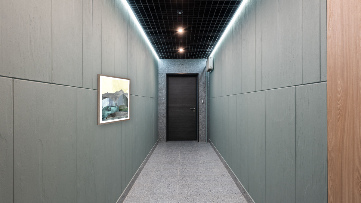 Dream Land 1 by Dan Hobday, shown at 30 × 42 in (76.2 × 106.7 cm) in Arber Light Walnut, hallway