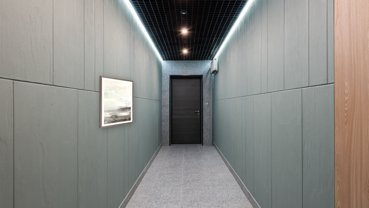 Down Tempo 2 by Dan Hobday, shown at 30 × 42 in (76.2 × 106.7 cm) in Arber Light Walnut, hallway