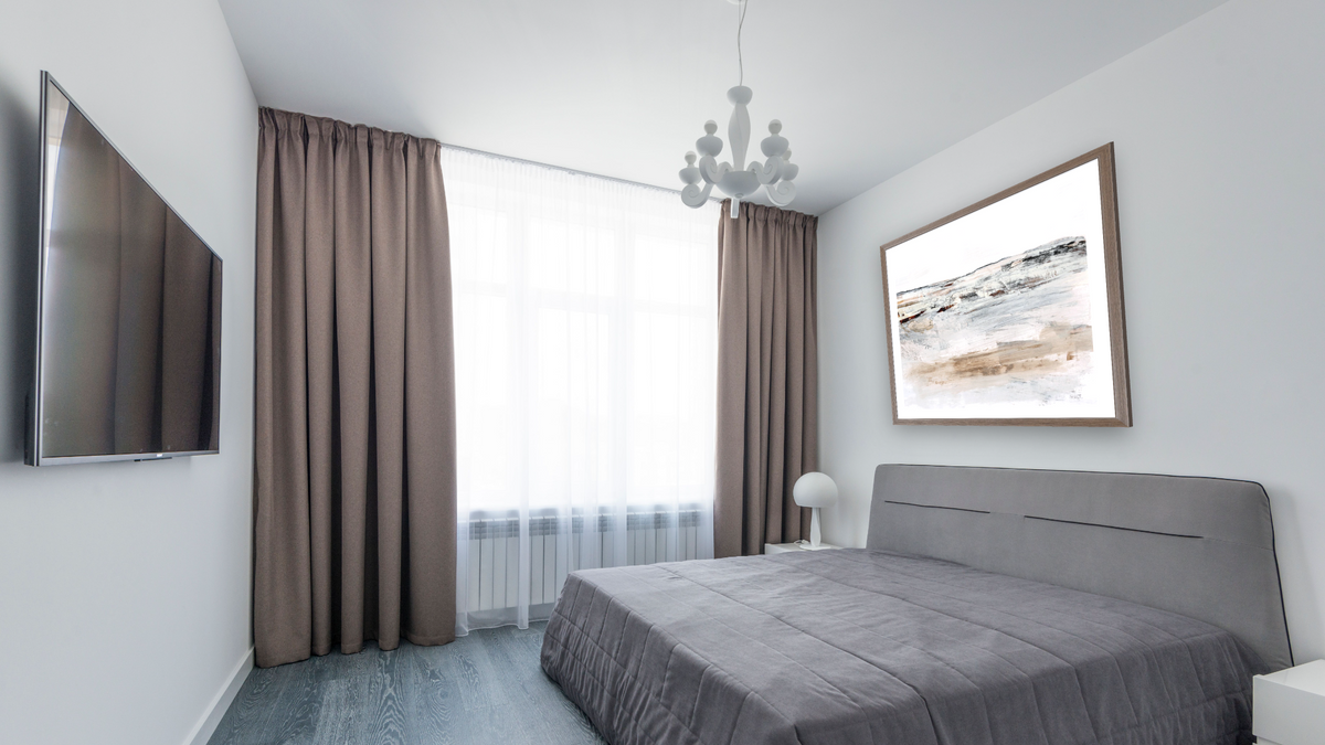 Classic by Dan Hobday, shown at 32 × 32 in (81.3 × 81.3 cm) in Arber Light Walnut, bedroom