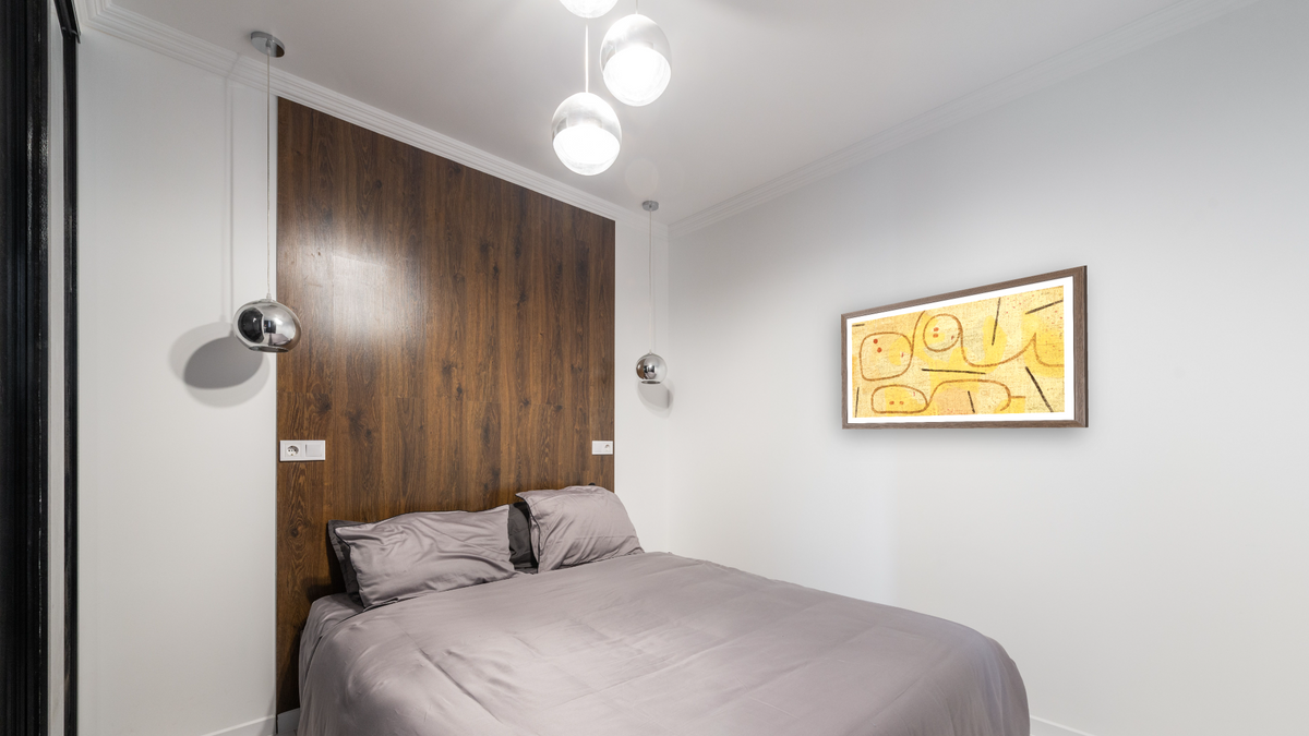 Reclining (Lying Down) by Paul Klee, shown at 22 × 40 in (55.9 × 101.6 cm) in Arber Light Walnut, bedroom