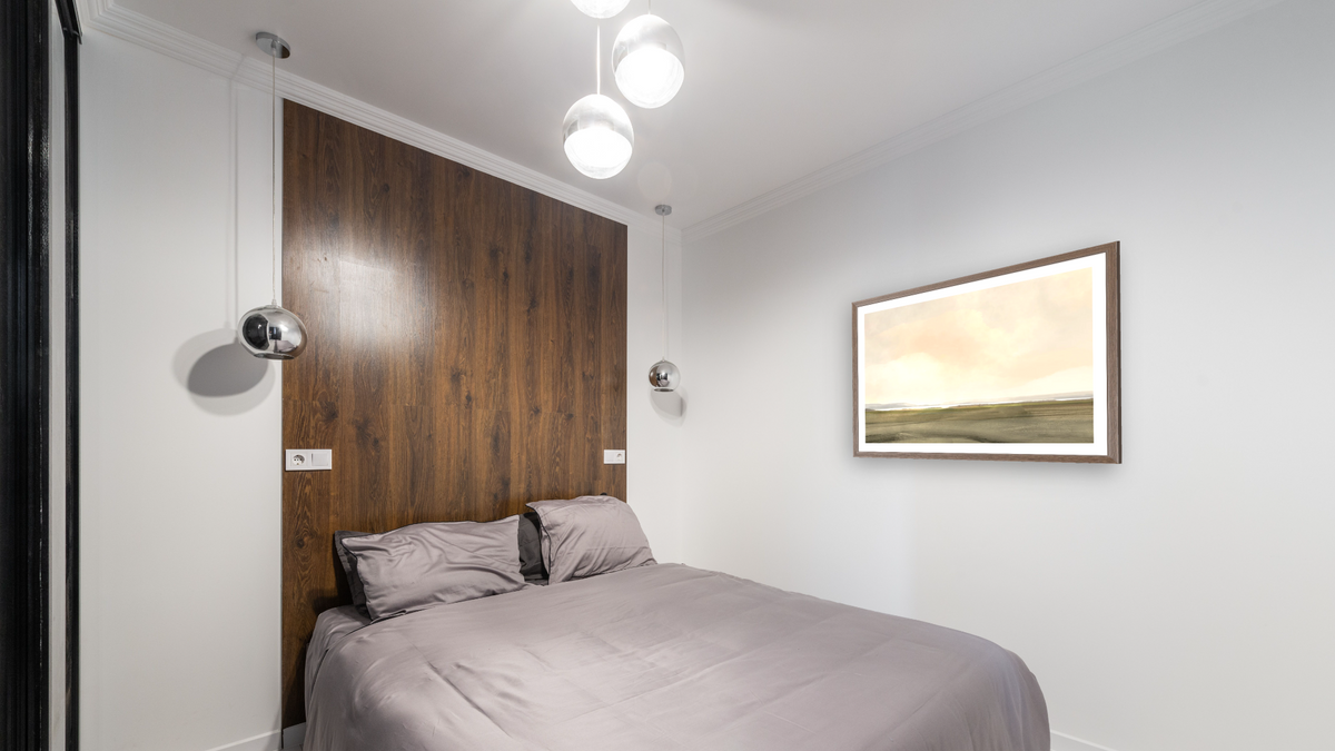 Estuary Dream by Dan Hobday, shown at 30 × 42 in (76.2 × 106.7 cm) in Arber Light Walnut, bedroom