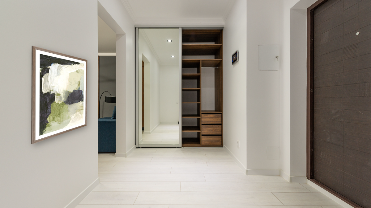 Lush 1 by Dan Hobday, shown at 30 × 42 in (76.2 × 106.7 cm) in Arber Light Walnut, hallway