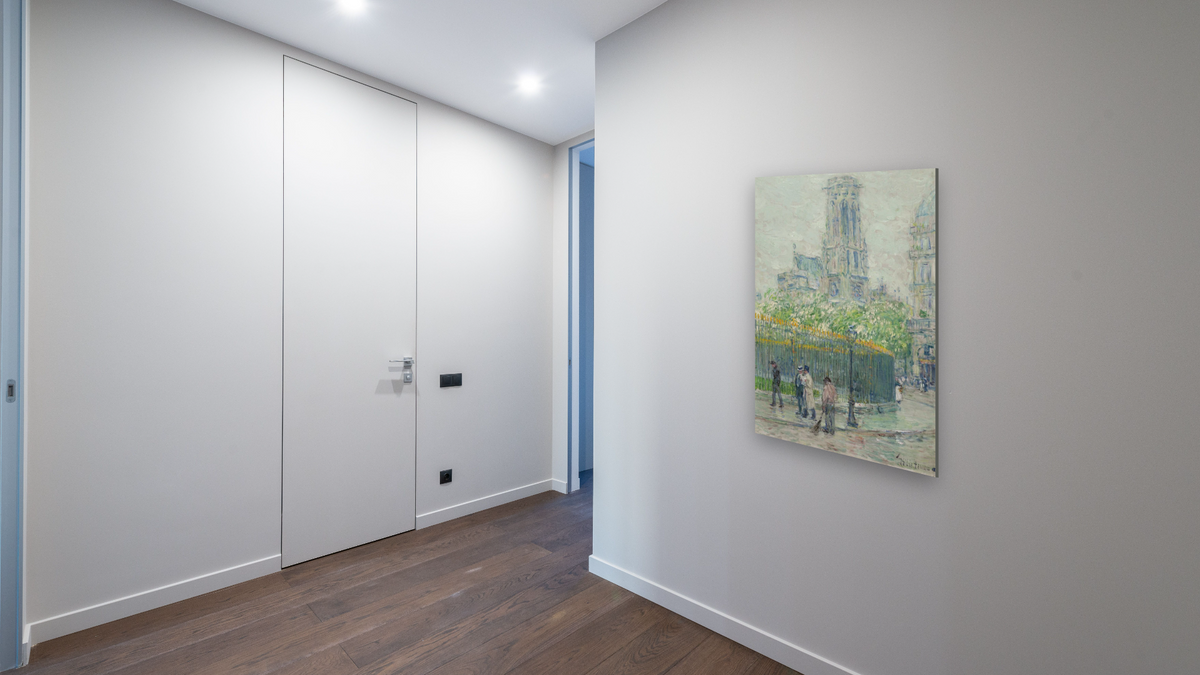 St. Germain l’Auxerrois by Childe Hassam, shown at 28 × 42 in (71.1 × 106.7 cm) as gallery-wrapped canvas, hallway