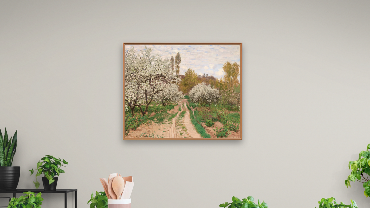 Apple Trees in Blossom by Claude Monet, shown at 32 × 40 in (81.3 × 101.6 cm) on canvas in Arber Raw Oak, dining