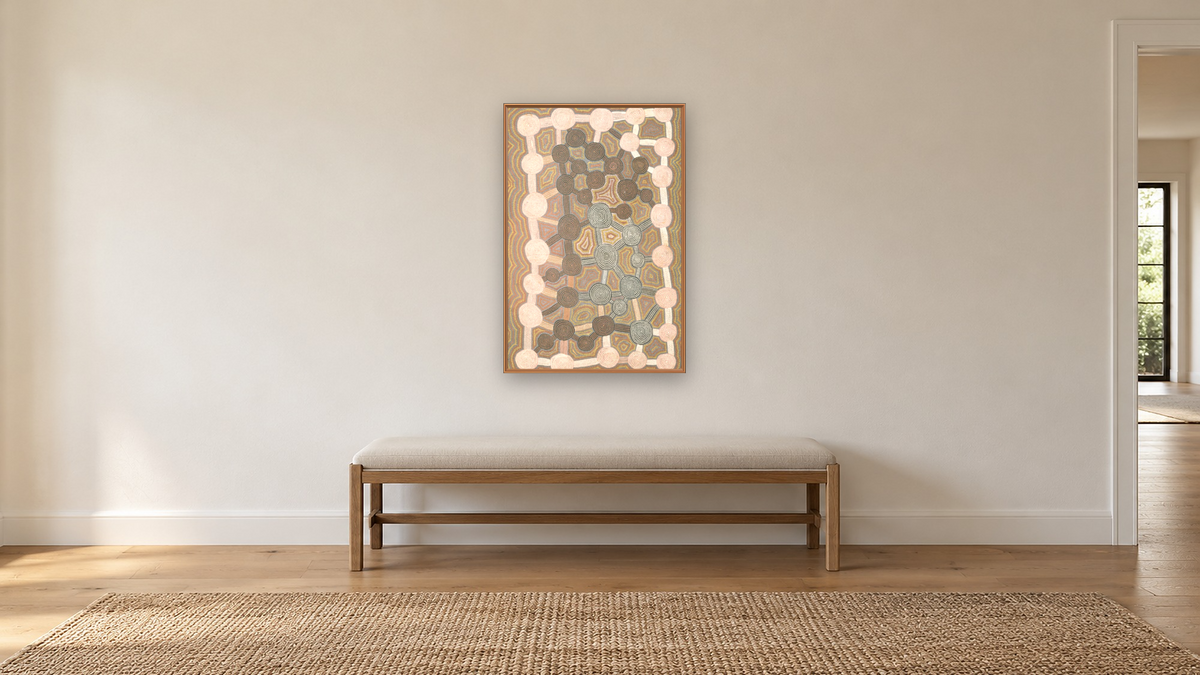 Tingari Myth by Yala Yala Gibbes, shown at 28 × 42 in (71.1 × 106.7 cm) on canvas in Arber Raw Oak, hallway