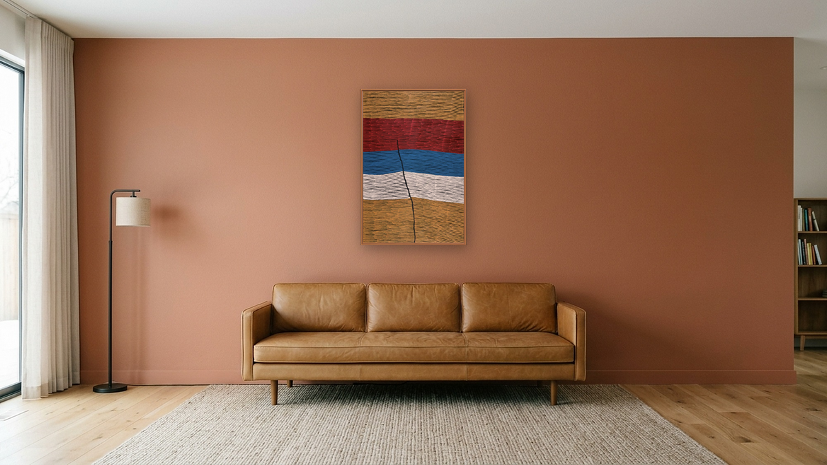 Bushfire dreaming by Ronnie Tjampitjinpa, shown at 28 × 42 in (71.1 × 106.7 cm) on canvas in Arber Raw Oak, media room