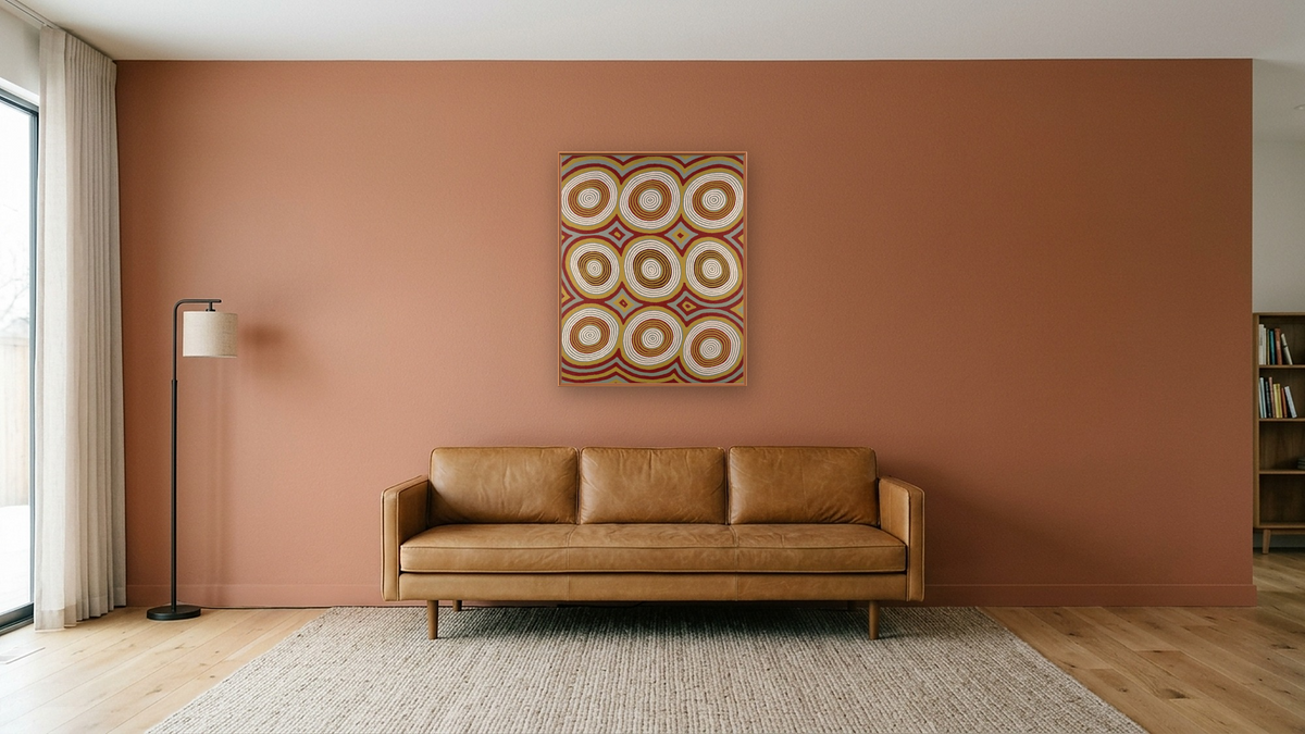Dream of Two Women by Ronnie Tjampitjinpa, shown at 32 × 40 in (81.3 × 101.6 cm) on canvas in Arber Raw Oak, media room