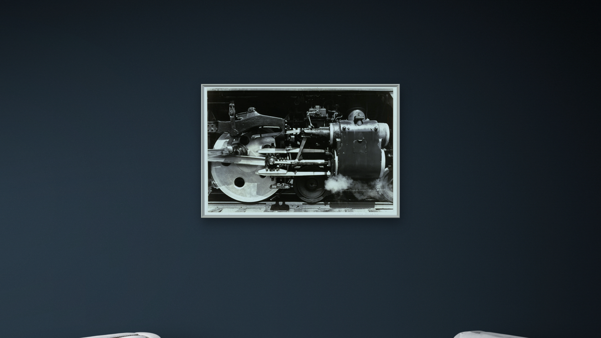 Wheels by Charles Sheeler, shown at 28 × 42 in (71.1 × 106.7 cm) on canvas in Ramino Opaque White, office
