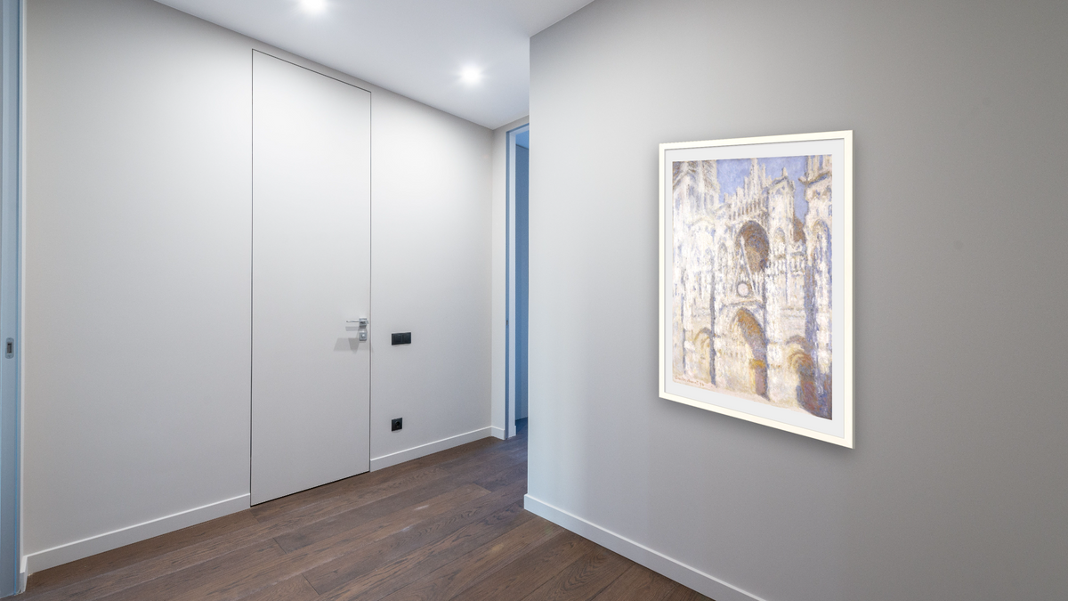 Rouen Cathedral In the Afternoon (The Gate In Full Sun) by Claude Monet, shown at 28 × 42 in (71.1 × 106.7 cm) in Ramino Opaque White, hallway
