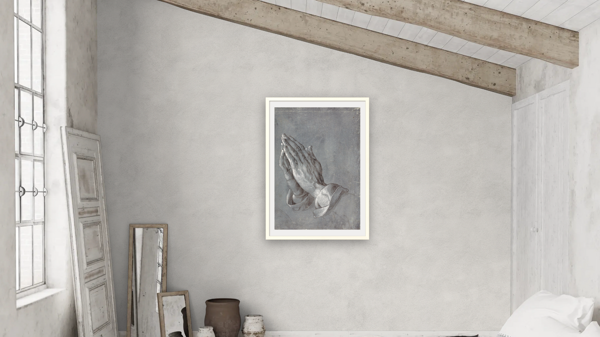 Praying Hands by Albrecht Dürer, shown at 28 × 42 in (71.1 × 106.7 cm) in Ramino Opaque White, bedroom