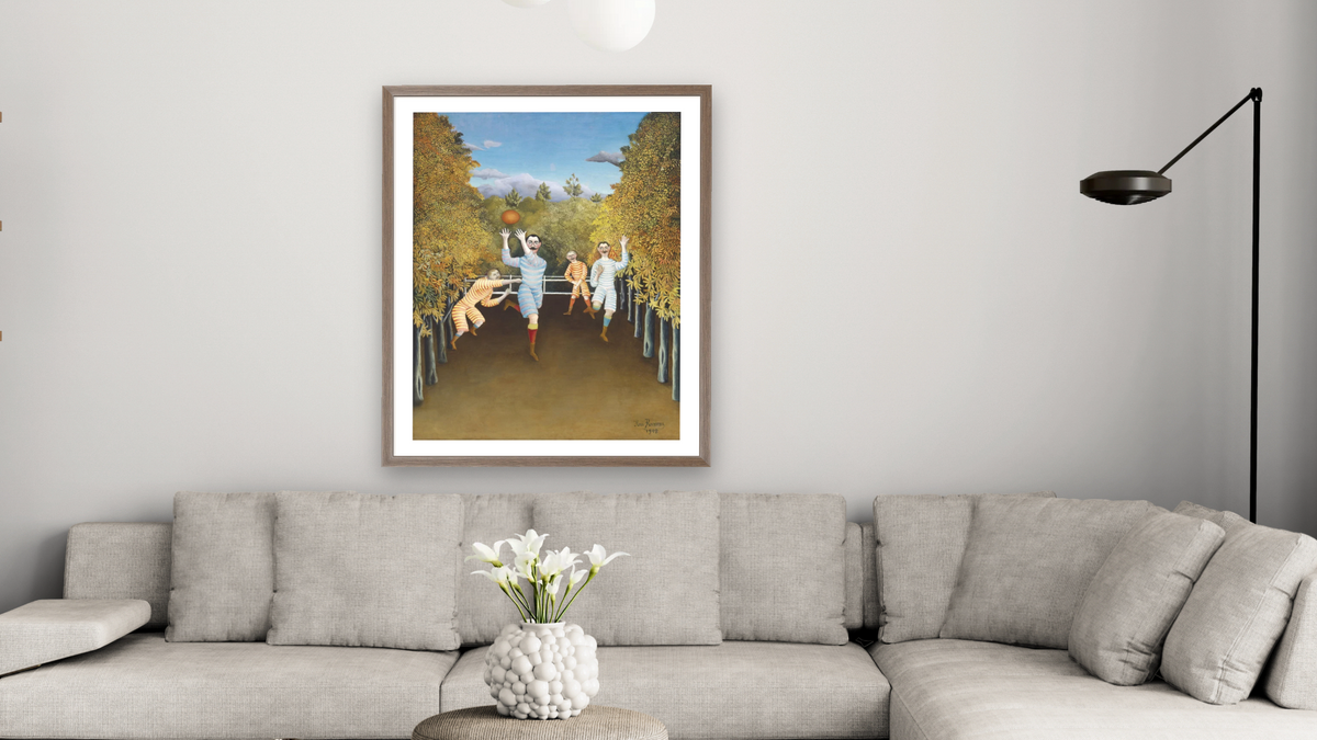 The Football Players by Henri Rousseau, shown at 32 × 40 in (81.3 × 101.6 cm) in Arber Light Walnut, living
