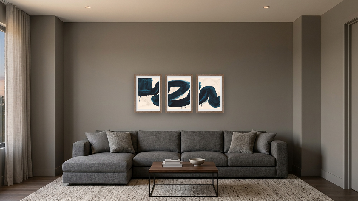 Triptych — Brush Stokes 1 × Brush Strokes 2 × Brush Strokes 3, shown at 14 × 21 in (35.6 × 53.3 cm) in Arber Light Walnut, media room
