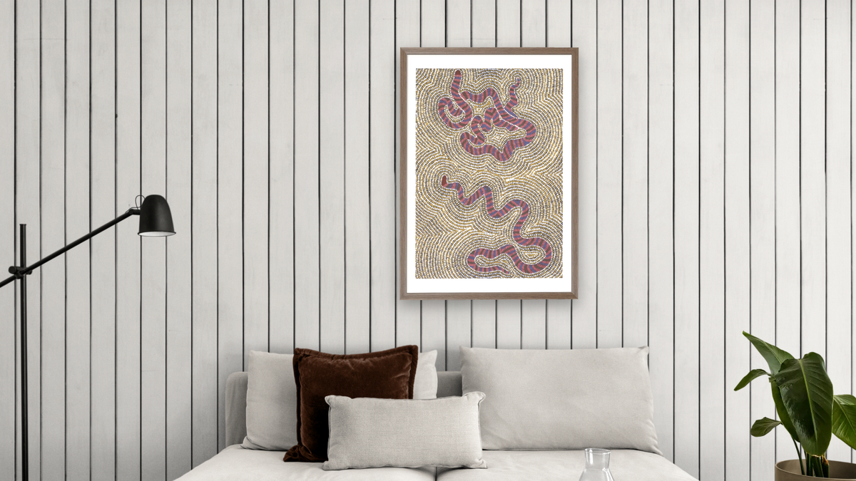 Snake Dreaming by Rene Robinson Napangardi, shown at 28 × 42 in (71.1 × 106.7 cm) in Arber Light Walnut, living