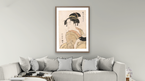 A bust portrait of the waitress Okita of the Naniwaya Teahouse by Kitagawa Utamaro, shown at 28 × 42 in (71.1 × 106.7 cm) in Arber Light Walnut, living [arteriel-render:v6:room_b:28x42@50,36]