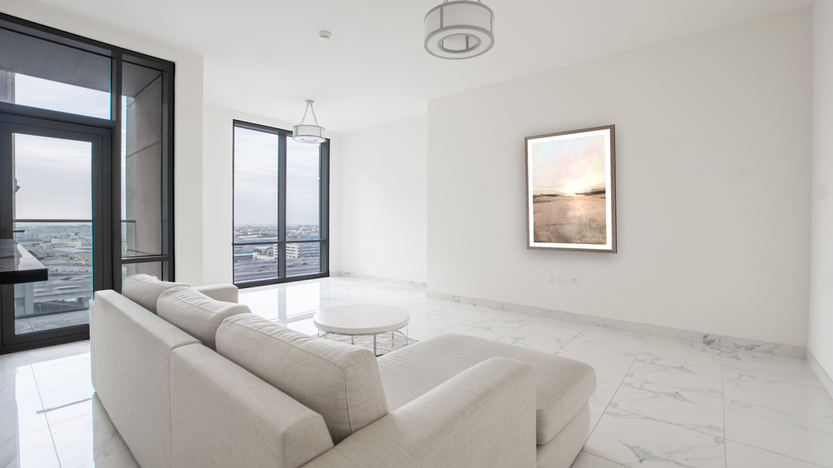 New Dawn by Dan Hobday, shown at 30 × 42 in (76.2 × 106.7 cm) in Arber Light Walnut, living