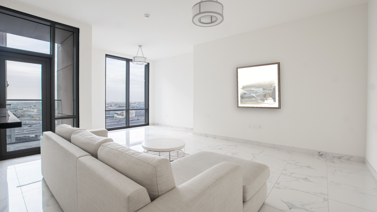 Nors by Dan Hobday, shown at 32 × 32 in (81.3 × 81.3 cm) in Arber Light Walnut, living