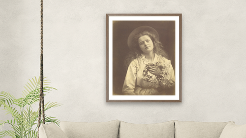 "For I'm to be Queen of the May, Mother, I'm to be Queen of the May" by Julia Margaret Cameron, shown at 30 × 40 in (76.2 × 101.6 cm) in Arber Light Walnut, living [arteriel-render:v6:room_b:30x40@58,42]