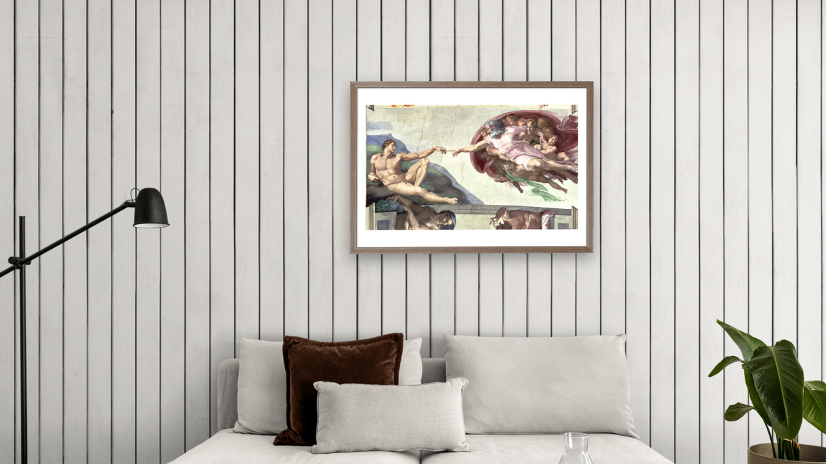 Sistine Chapel Ceiling: The Creation of Adam (post restoration) by Michelangelo Buonarroti, shown at 28 × 42 in (71.1 × 106.7 cm) in Arber Light Walnut, living