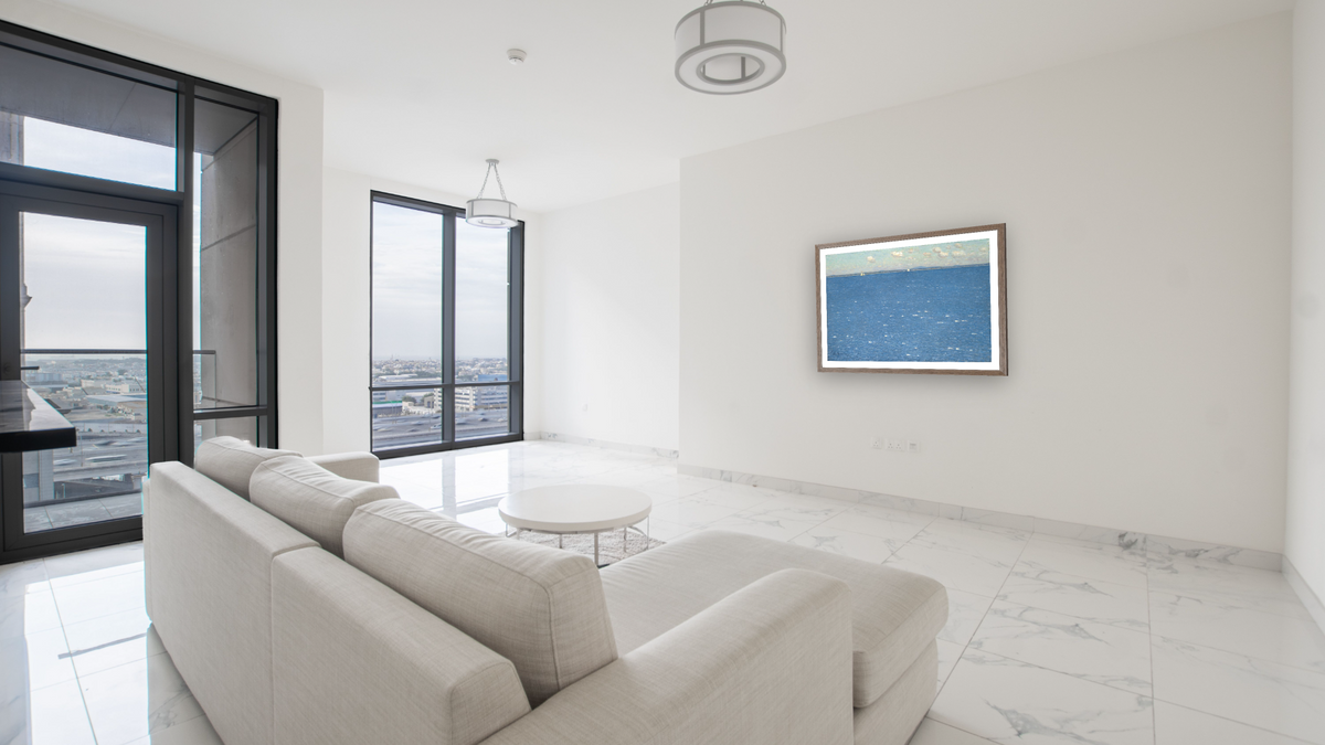 The West Wind, Isles of Shoals by Childe Hassam, shown at 29 × 42 in (73.7 × 106.7 cm) in Arber Light Walnut, living