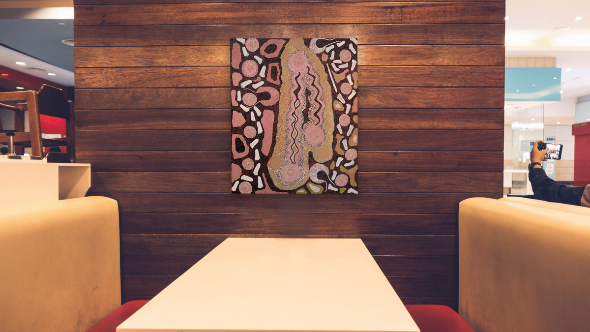 Big Snake Dreaming by Anatjari Tjakamarra, shown at 32 × 40 in (81.3 × 101.6 cm) as gallery-wrapped canvas, restaurant