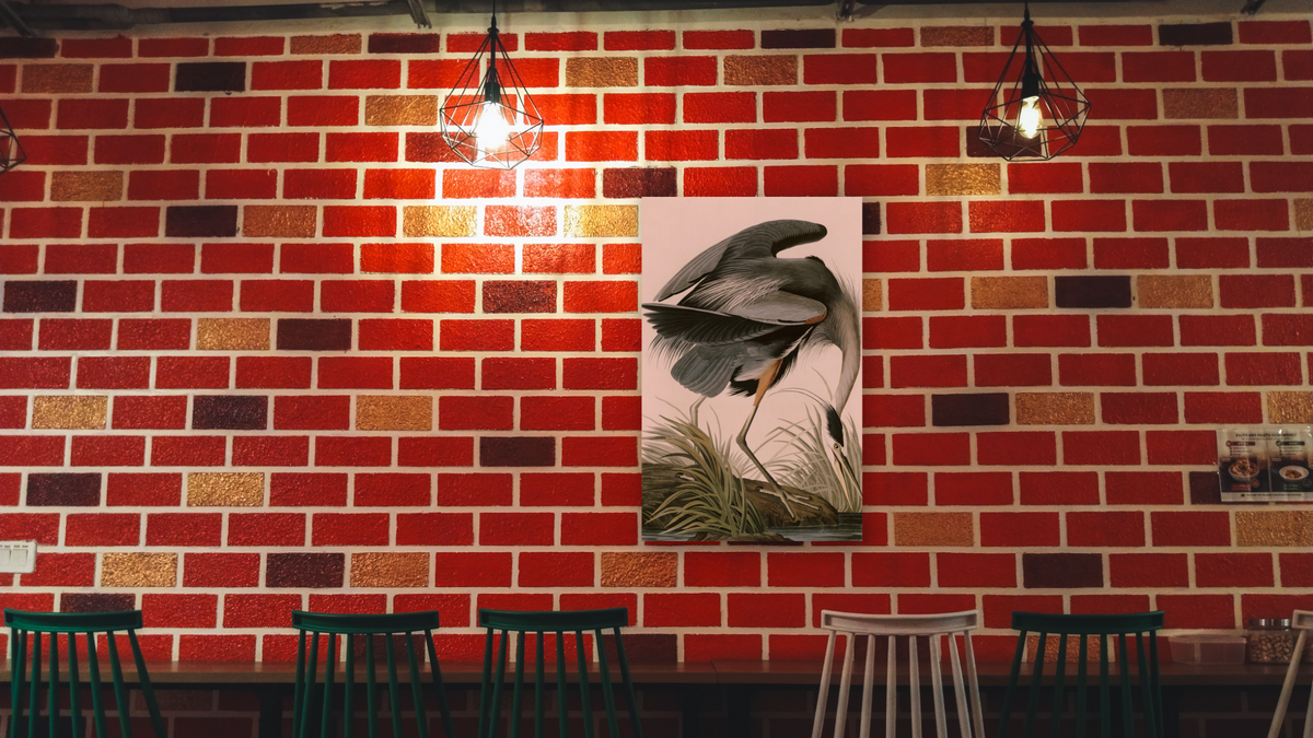 Great Blue Heron by John James Audubon, shown at 28 × 42 in (71.1 × 106.7 cm) as gallery-wrapped canvas, restaurant
