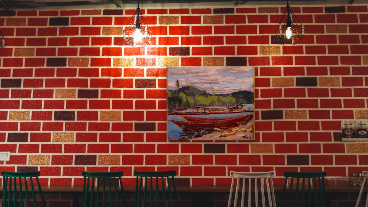 Bateaux by Tom Thomson, shown at 32 × 40 in (81.3 × 101.6 cm) as gallery-wrapped canvas, restaurant