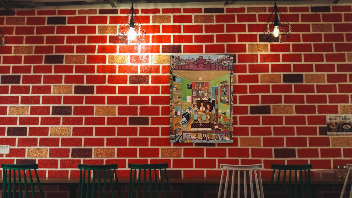 Family Supper by Ralph Fasanella, shown at 30 × 40 in (76.2 × 101.6 cm) as gallery-wrapped canvas, restaurant