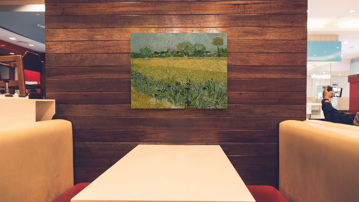 Field with Flowers near Arles by Vincent van Gogh, shown at 32 × 40 in (81.3 × 101.6 cm) as gallery-wrapped canvas, restaurant