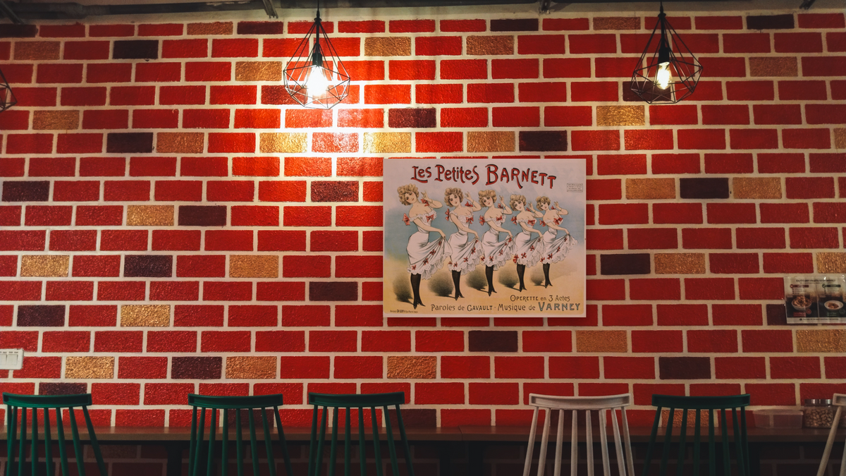 Les Petites Barnett Poster by Unknown, shown at 30 × 40 in (76.2 × 101.6 cm) as gallery-wrapped canvas, restaurant