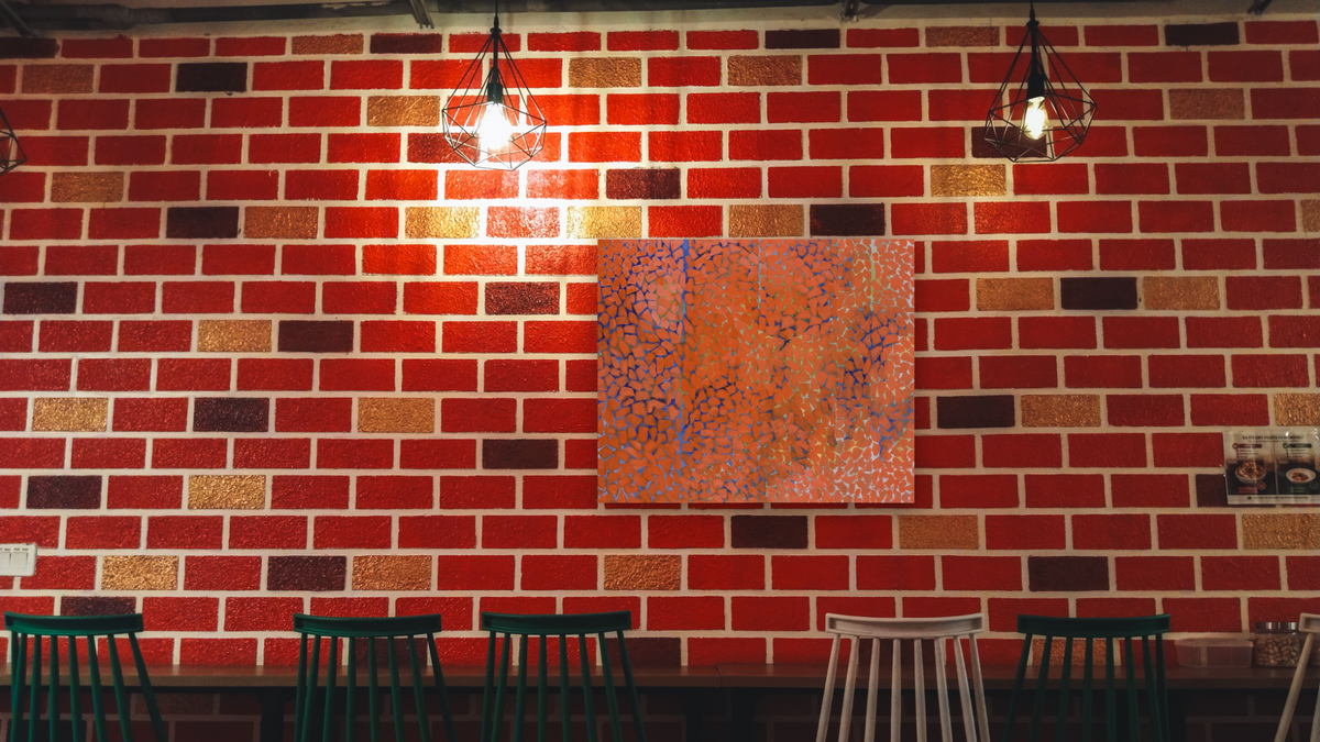 Autumn Leaves Fluttering in the Breeze by Alma Thomas, shown at 32 × 40 in (81.3 × 101.6 cm) as gallery-wrapped canvas, restaurant