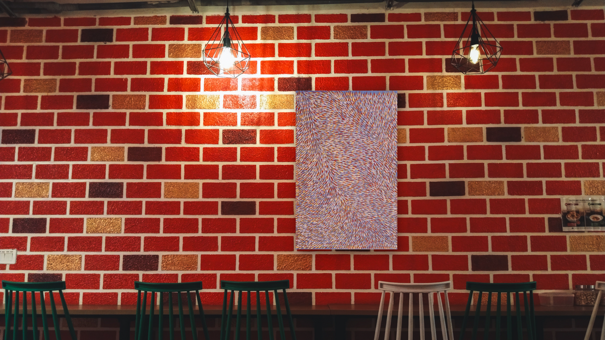 Leaves by Gloria Tamerre Petyarr, shown at 28 × 42 in (71.1 × 106.7 cm) as gallery-wrapped canvas, restaurant