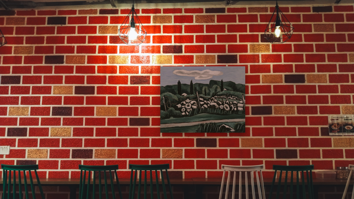 The Last Stone Walls, Dogtown by Marsden Hartley, shown at 30 × 40 in (76.2 × 101.6 cm) as gallery-wrapped canvas, restaurant