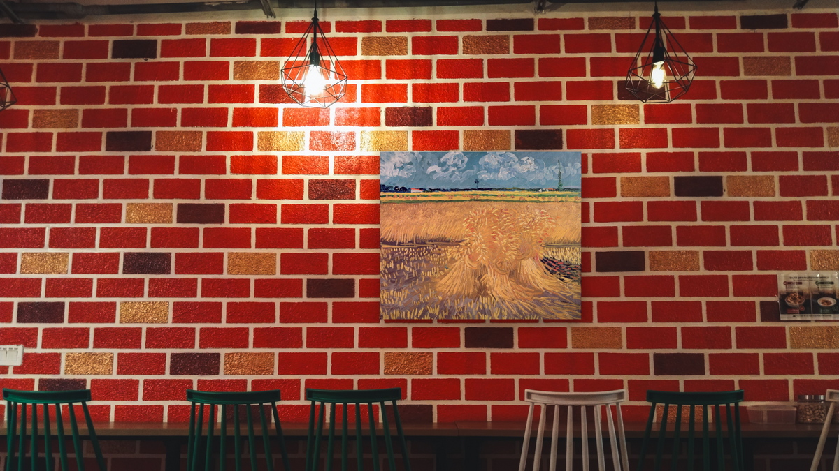 Wheat Field (Le Champ de Blé) by Vincent van Gogh, shown at 32 × 40 in (81.3 × 101.6 cm) as gallery-wrapped canvas, restaurant