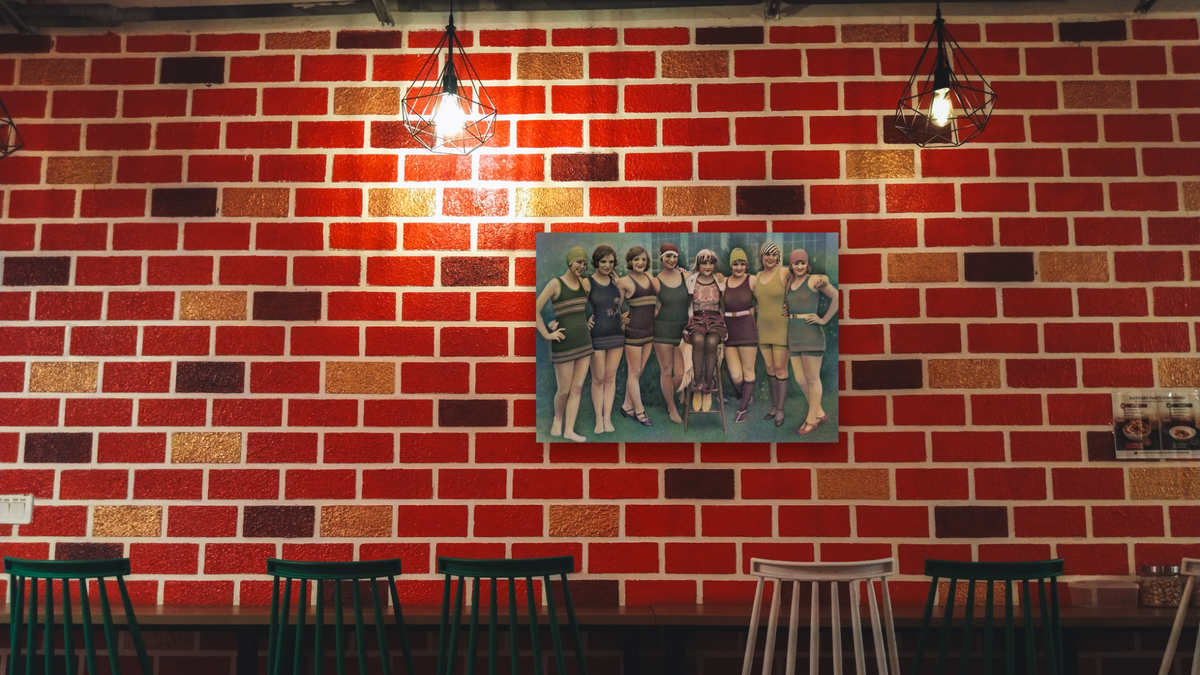 Swimmers by Kirsten Söderlind, shown at 28 × 42 in (71.1 × 106.7 cm) as gallery-wrapped canvas, restaurant