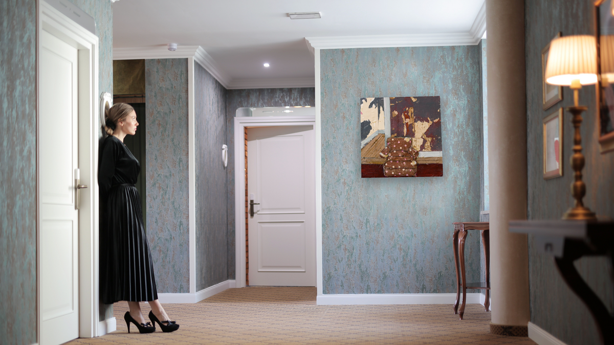 A Story to Tell by Dobee Snowber, shown at 32 × 32 in (81.3 × 81.3 cm) as gallery-wrapped canvas, hotel lobby