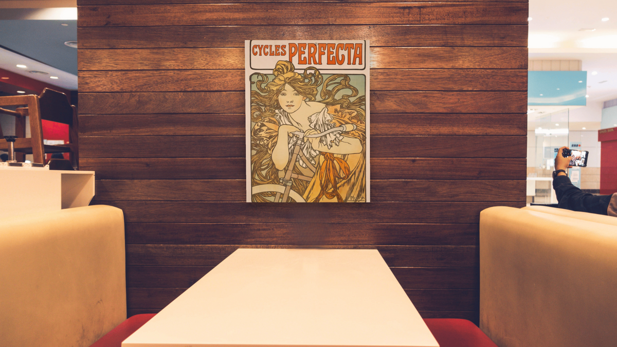 Cycles Perfecta by Alphonse Mucha, shown at 30 × 40 in (76.2 × 101.6 cm) as gallery-wrapped canvas, restaurant