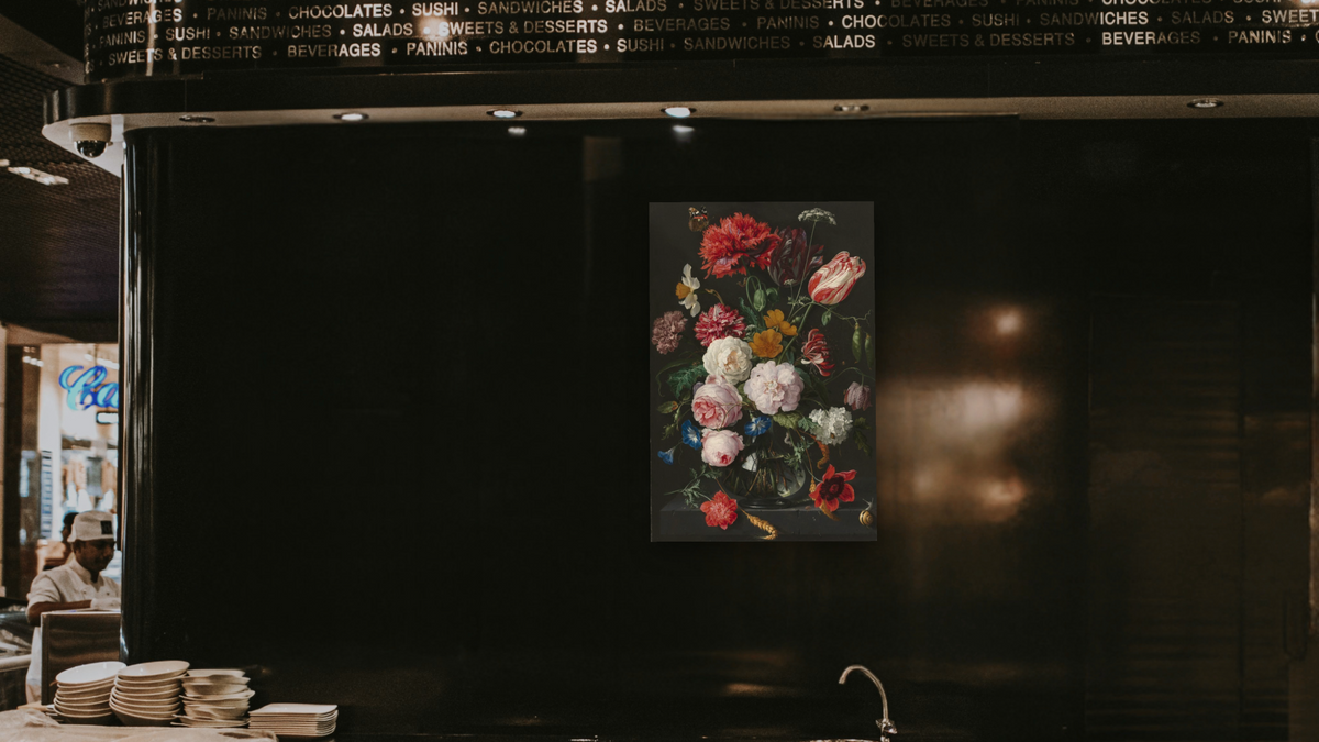 Still Life with Flowers in a Glass Vase by Jan Davidsz de Heem, shown at 28 × 42 in (71.1 × 106.7 cm) as gallery-wrapped canvas, restaurant