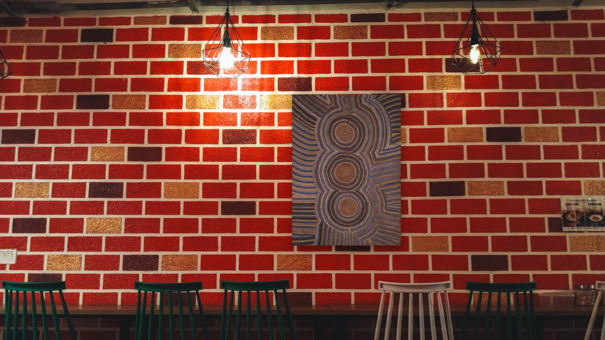 Women's Dreaming, shown at 30 × 40 in (76.2 × 101.6 cm) as gallery-wrapped canvas, restaurant