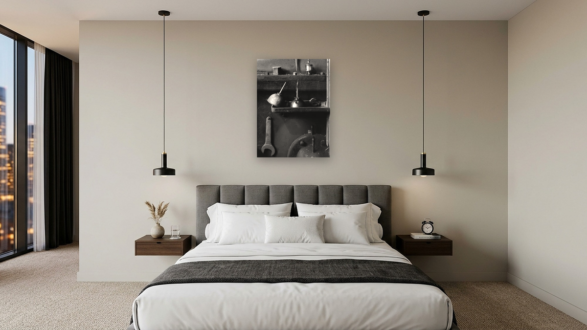 Wrenches and Oil Cans by Gordon Osmundson, shown at 30 × 40 in (76.2 × 101.6 cm) as gallery-wrapped canvas, hotel guest room
