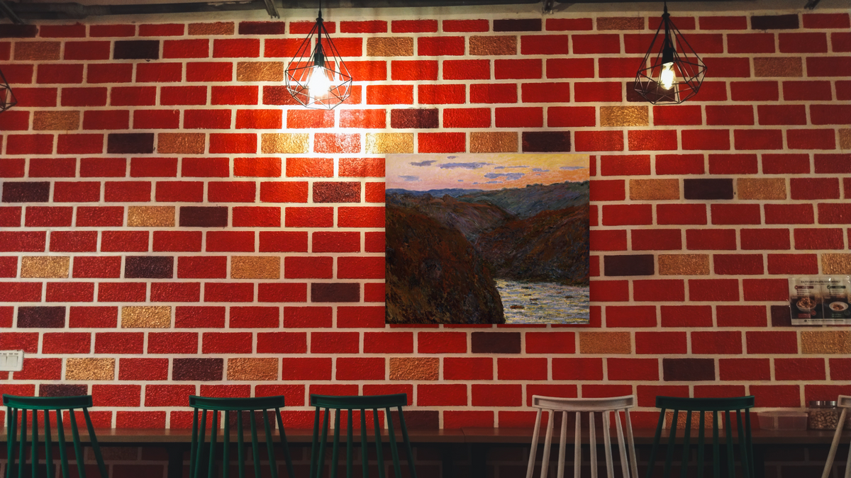 La Creuse, Sunset by Claude Monet, shown at 32 × 40 in (81.3 × 101.6 cm) as gallery-wrapped canvas, restaurant