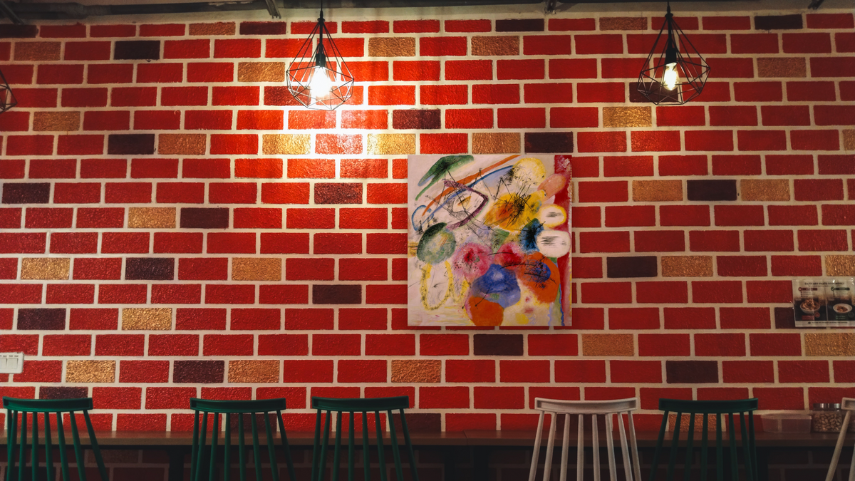 Black Lines, shown at 32 × 32 in (81.3 × 81.3 cm) as gallery-wrapped canvas, restaurant