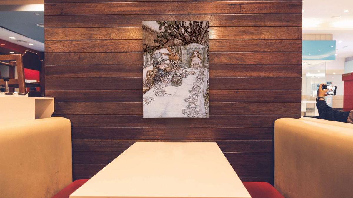 Alice in Wonderland: The Mad Tea Party, shown at 28 × 42 in (71.1 × 106.7 cm) as gallery-wrapped canvas, restaurant