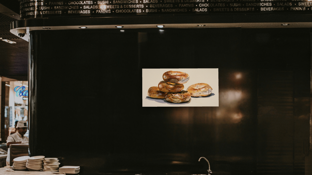 Bagels by Charles Bell, shown at 20 × 40 in (50.8 × 101.6 cm) as gallery-wrapped canvas, restaurant
