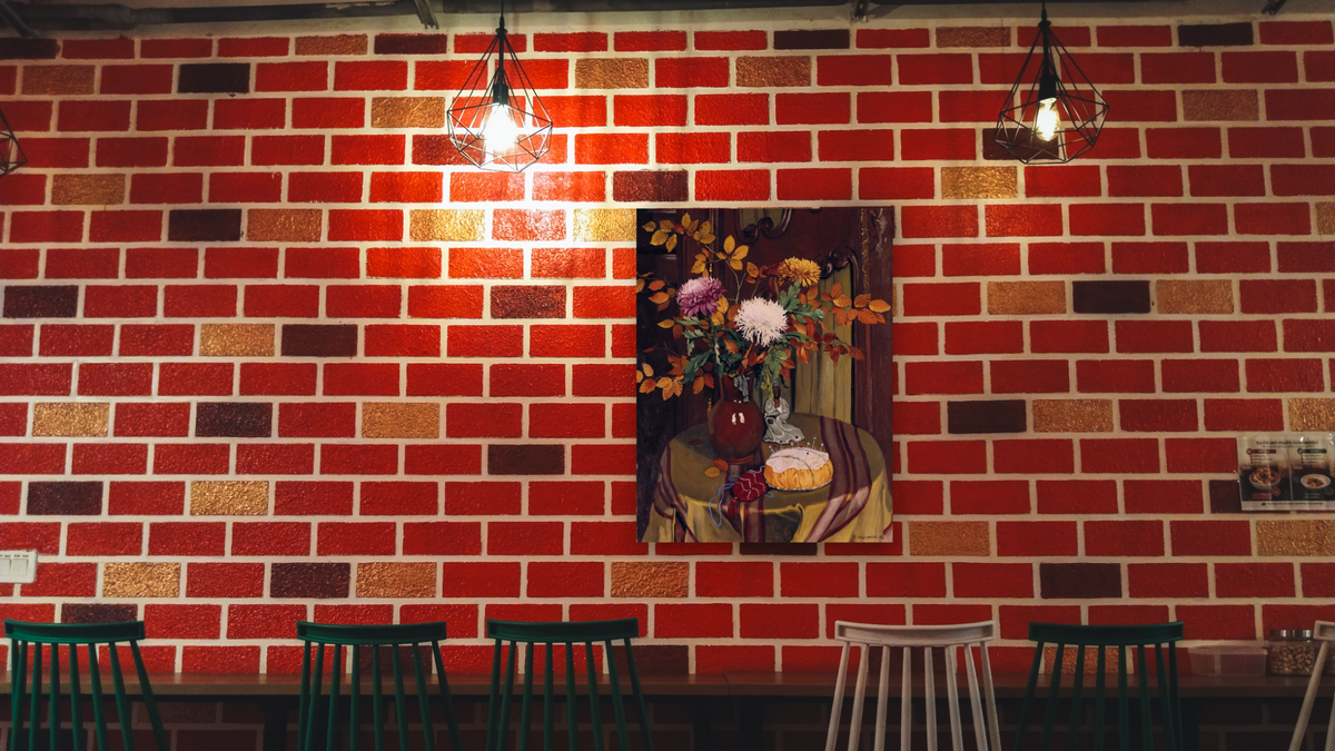 Chrysanthemums and Autumn Foilage by Félix Vallotton, shown at 32 × 40 in (81.3 × 101.6 cm) as gallery-wrapped canvas, restaurant