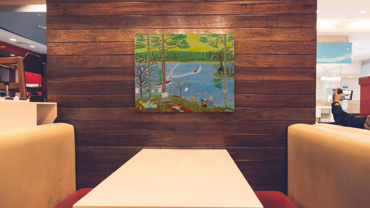 Marc Fishing by Ralph Fasanella, shown at 32 × 40 in (81.3 × 101.6 cm) as gallery-wrapped canvas, restaurant